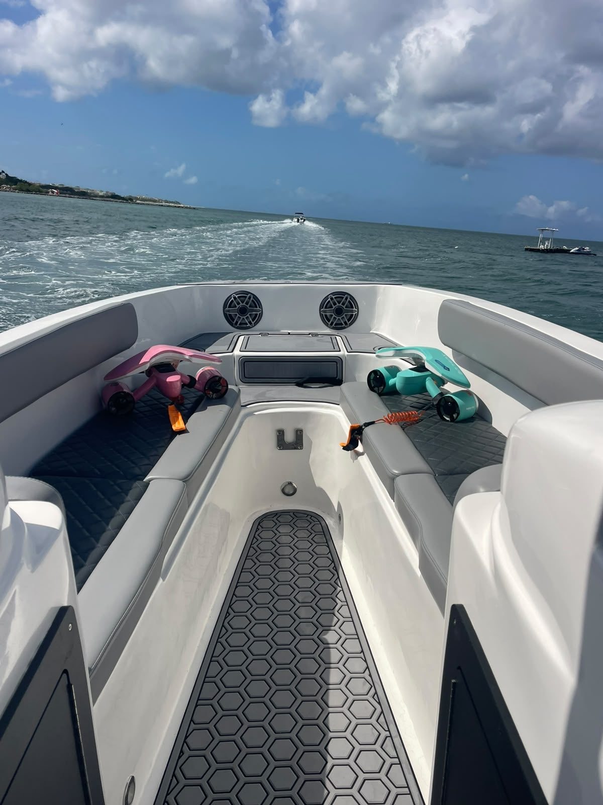 The boat deck with two underwater scooters on board