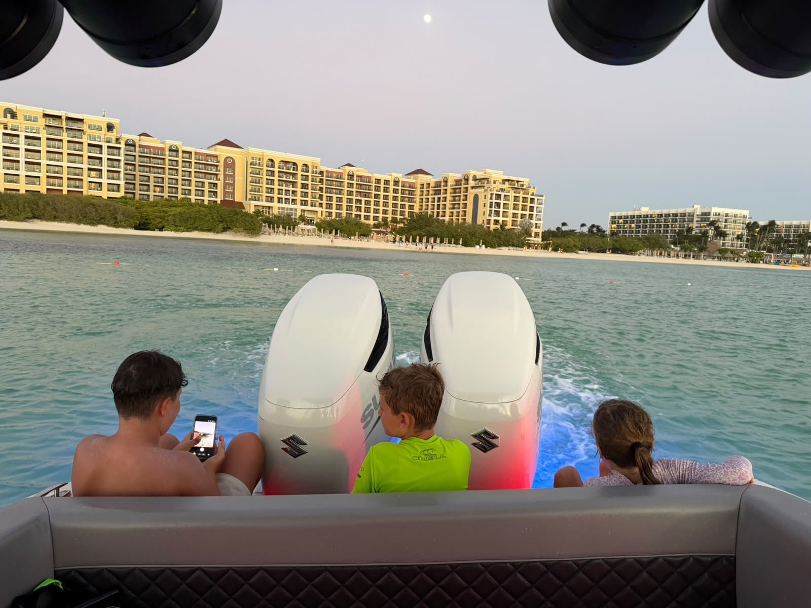 Guests on the stern of the Aruban Breeze boat off Palm Beach